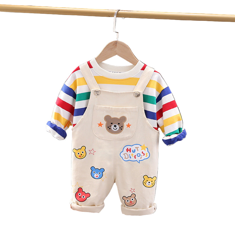 Children's outfit with striped shirt and bear-themed overalls on a hanger against a white background.